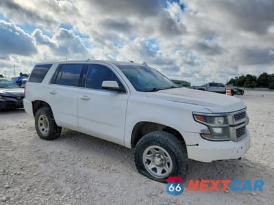 Czwarte zdjęcie samochodu z boku: 2019 CHEVROLET TAHOE SPECIAL VIN:1GNSKFEC5KR125378 - miniatura