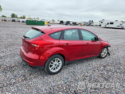 Trzecie zdjęcie samochodu z tyłu: 2017 FORD FOCUS SE VIN:1FADP3K24HL213952 - miniatura