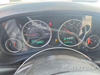 Zdjęcie 9 z 12 samochodu: 2011 JEEP WRANGLER UNLIMITED SAHARA VIN:1J4HA5H14BL575952 - miniatura