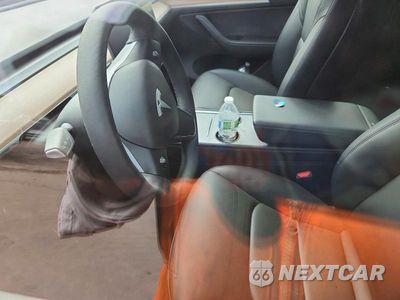 Zdjęcie 7 z 13 samochodu: 2023 TESLA MODEL Y VIN:7SAYGDEE5PA107048 - miniatura