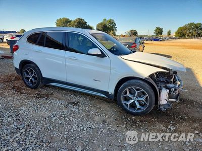 Czwarte zdjęcie samochodu z boku: 2017 BMW X1 XDRIVE28I VIN:WBXHT3Z35H4A65302 - miniatura