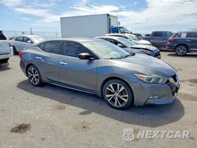 Czwarte zdjęcie samochodu z boku: 2016 NISSAN MAXIMA 3.5 S VIN:1N4AA6AP0GC377944 - miniatura