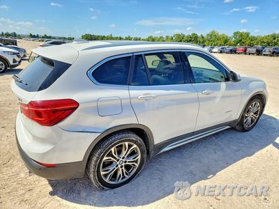 Trzecie zdjęcie samochodu z tyłu: 2016 BMW X1 XDRIVE28I VIN:WBXHT3Z35G4A51642 - miniatura