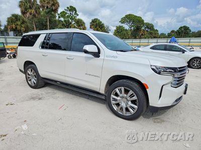 Czwarte zdjęcie samochodu z boku: 2021 CHEVROLET SUBURBAN K1500 HIGH COUNTRY VIN:1GNSKGKL9MR209264 - miniatura