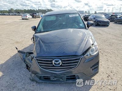 Piąte zdjęcie samochodu w środku: 2016 MAZDA CX-5 SPORT VIN:JM3KE2BY6G0821355 - miniatura