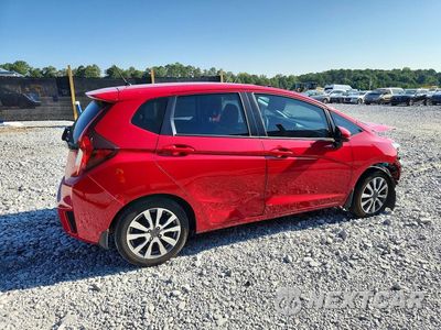 Trzecie zdjęcie samochodu z tyłu: 2015 HONDA FIT LX VIN:3HGGK5G5XFM733672 - miniatura