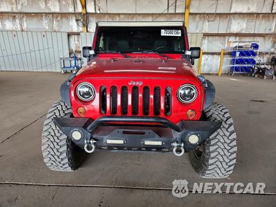 Piąte zdjęcie samochodu w środku: 2012 JEEP WRANGLER UNLIMITED SAHARA VIN:1C4BJWEGXCL188981 - miniatura