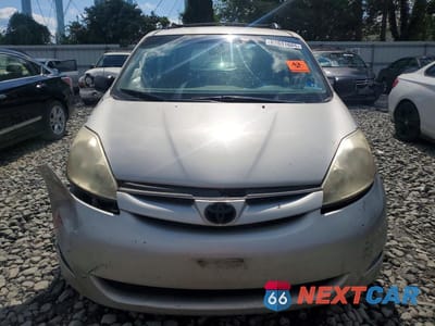 Piąte zdjęcie samochodu w środku: 2010 TOYOTA SIENNA CE 7-PASSENGER VIN:5TDKK4CC4AS311302 - miniatura