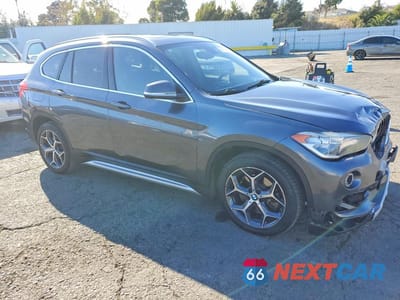 Czwarte zdjęcie samochodu z boku: 2018 BMW X1 SDRIVE28I VIN:WBXHU7C39J5L06627 - miniatura
