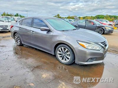 Czwarte zdjęcie samochodu z boku: 2017 NISSAN ALTIMA 2.5 SV VIN:1N4AL3AP7HC223886 - miniatura