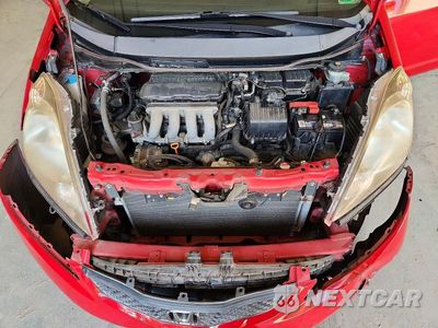 Zdjęcie 11 z 13 samochodu: 2009 HONDA FIT SPORT VIN:JHMGE884X9S021038 - miniatura