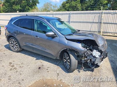 Czwarte zdjęcie samochodu z boku: 2021 FORD ESCAPE TITANIUM VIN:1FMCU9J9XMUA54211 - miniatura