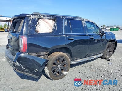Trzecie zdjęcie samochodu z tyłu: 2018 GMC YUKON SLE VIN:1GKS1AKC0JR226379 - miniatura