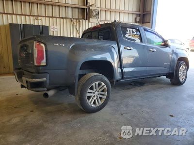 Trzecie zdjęcie samochodu z tyłu: 2016 GMC CANYON SLT VIN:1GTP6DE1XG1265969 - miniatura