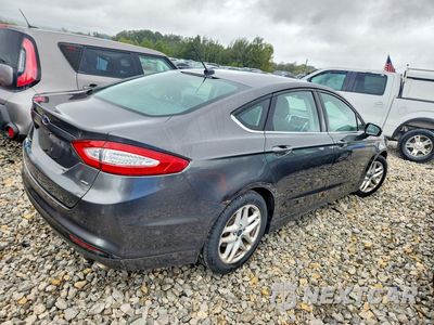 Trzecie zdjęcie samochodu z tyłu: 2016 FORD FUSION SE VIN:3FA6P0H70GR112031 - miniatura