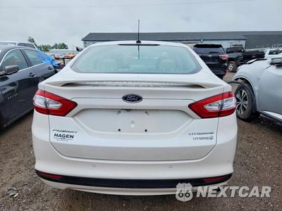 Zdjęcie 6 z 12 samochodu: 2014 FORD FUSION TITANIUM HEV VIN:3FA6P0RU9ER210458 - miniatura