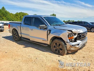 Czwarte zdjęcie samochodu z boku: 2022 FORD F150 SUPERCREW VIN:1FTFW1ED5NFB23582 - miniatura