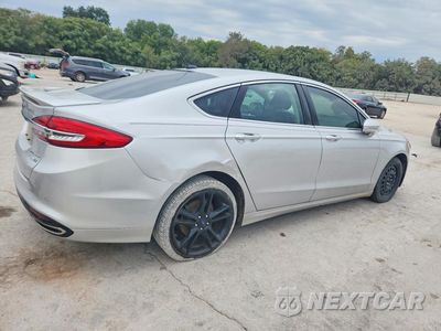 Trzecie zdjęcie samochodu z tyłu: 2017 FORD FUSION TITANIUM VIN:3FA6P0D90HR273455 - miniatura