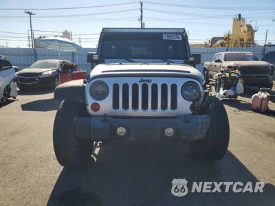Piąte zdjęcie samochodu w środku: 2012 JEEP WRANGLER UNLIMITED RUBICON VIN:1C4HJWFG5CL211172 - miniatura