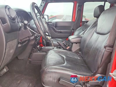 Zdjęcie 7 z 13 samochodu: 2014 JEEP WRANGLER UNLIMITED SAHARA VIN:1C4HJWEG0EL324418 - miniatura