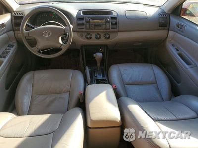 Zdjęcie 8 z 12 samochodu: 2002 TOYOTA CAMRY LE VIN:JTDBE32K020092420 - miniatura