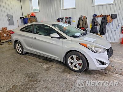Czwarte zdjęcie samochodu z boku: 2013 HYUNDAI ELANTRA COUPE GS VIN:KMHDH6AE4DU006742 - miniatura