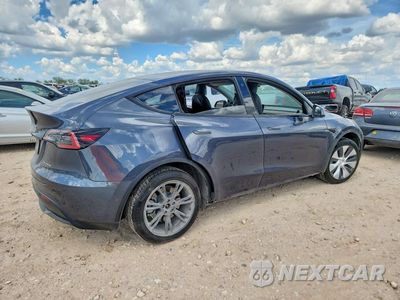 Trzecie zdjęcie samochodu z tyłu: 2022 TESLA MODEL Y VIN:7SAYGAEE4NF398740 - miniatura