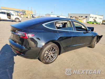 Piąte zdjęcie samochodu w środku: 2019 TESLA MODEL 3 VIN:5YJ3E1EB9KF199052 - miniatura