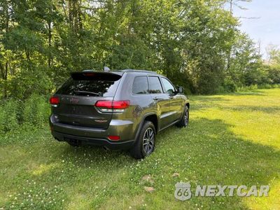 Czwarte zdjęcie samochodu z boku: 2018 JEEP GRAND CHEROKEE TRAILHAWK VIN:1C4RJFLGXJC300287 - miniatura