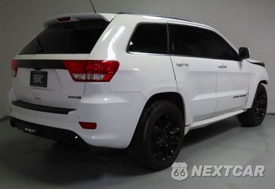 Trzecie zdjęcie samochodu z tyłu: 2013 JEEP GRAND CHEROKEE SRT-8 VIN:1C4RJFDJ4DC563714 - miniatura