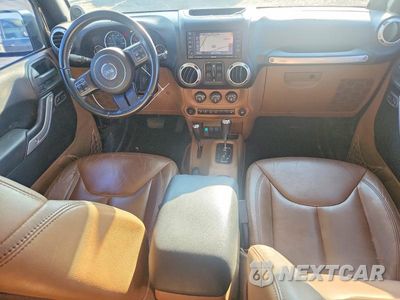 Zdjęcie 8 z 12 samochodu: 2014 JEEP WRANGLER UNLIMITED SAHARA VIN:1C4HJWEG6EL109741 - miniatura