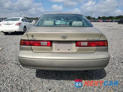 Zdjęcie 6 z 12 samochodu: 1999 TOYOTA CAMRY LE VIN:JT2BG22KXX0298283 - miniatura