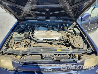Zdjęcie 12 z 13 samochodu: 2002 INFINITI QX4 BASE VIN:JNRDR09Y12W259676 - miniatura