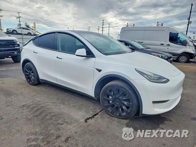 Czwarte zdjęcie samochodu z boku: 2022 TESLA MODEL Y VIN:7SAYGDEE7NA010804 - miniatura