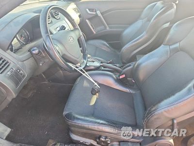 Zdjęcie 7 z 12 samochodu: 2007 HYUNDAI TIBURON GT VIN:KMHHN66F77U250465 - miniatura