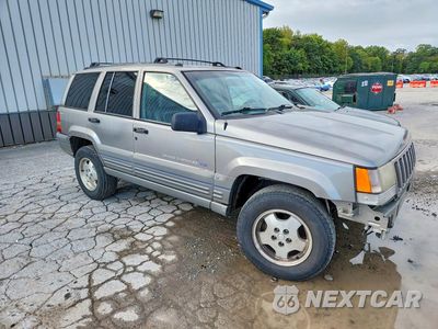 Czwarte zdjęcie samochodu z boku: 1997 JEEP GRAND CHEROKEE LAREDO VIN:1J4GZ58Y7VC711433 - miniatura
