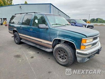 Czwarte zdjęcie samochodu z boku: 1997 CHEVROLET SUBURBAN K1500 VIN:1GNFK16R7VJ365817 - miniatura