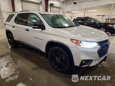 Czwarte zdjęcie samochodu z boku: 2021 CHEVROLET TRAVERSE PREMIER VIN:1GNEVKKW5MJ111252 - miniatura