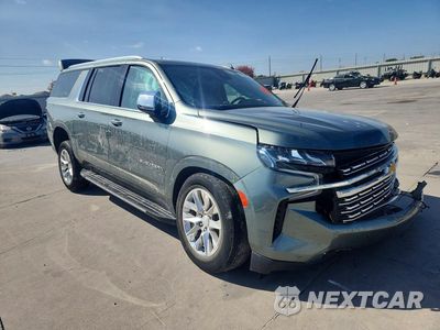 Czwarte zdjęcie samochodu z boku: 2023 CHEVROLET SUBURBAN C1500 PREMIER VIN:1GNSCFKD1PR549755 - miniatura