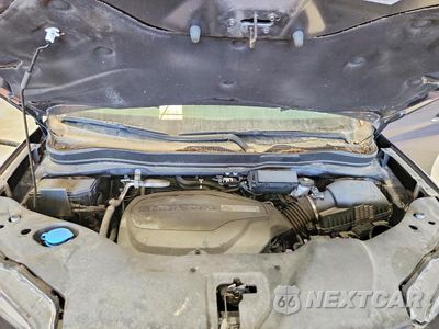 Zdjęcie 12 z 13 samochodu: 2020 HONDA PASSPORT TOURING VIN:5FNYF8H92LB011901 - miniatura