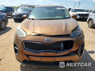 Piąte zdjęcie samochodu w środku: 2017 KIA SPORTAGE LX VIN:KNDPM3AC9H7065476 - miniatura