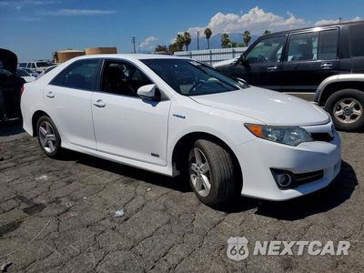 Czwarte zdjęcie samochodu z boku: 2014 TOYOTA CAMRY HYBRID SE VIN:4T1BD1FK7EU138142 - miniatura