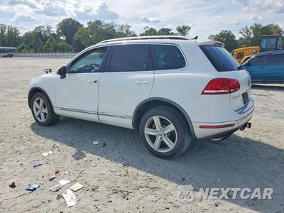 Drugie zdjęcie samochodu z przodu: 2015 VOLKSWAGEN TOUAREG HYBRID VIN:WVGEG9BP1FD006693 - miniatura