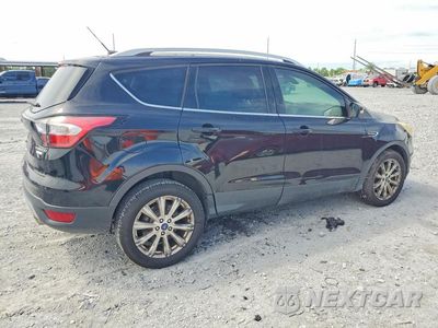 Trzecie zdjęcie samochodu z tyłu: 2017 FORD ESCAPE TITANIUM VIN:1FMCU0J9XHUE65142 - miniatura