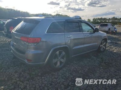 Trzecie zdjęcie samochodu z tyłu: 2014 JEEP GRAND CHEROKEE OVERLAND VIN:1C4RJFCT5EC207695 - miniatura