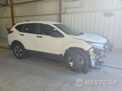 Czwarte zdjęcie samochodu z boku: 2018 HONDA CR-V LX VIN:5J6RW5H39JL001059 - miniatura