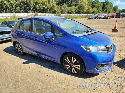 Czwarte zdjęcie samochodu z boku: 2018 HONDA FIT EX VIN:3HGGK5H88JM712546 - miniatura