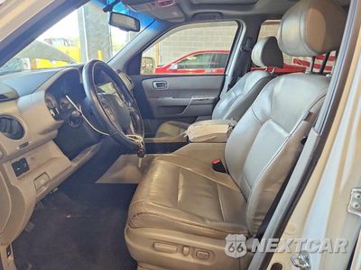 Zdjęcie 7 z 13 samochodu: 2011 HONDA PILOT TOURING VIN:5FNYF4H92BB049121 - miniatura