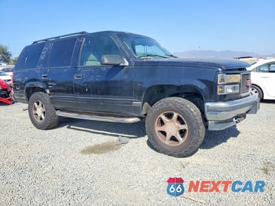 Czwarte zdjęcie samochodu z boku: 1997 GMC YUKON VIN:1GKEK13R7VJ700085 - miniatura