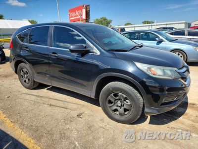 Czwarte zdjęcie samochodu z boku: 2016 HONDA CRV LX VIN:5J6RM4H34GL089060 - miniatura